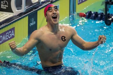 Japan's Daiya Seto swimming for the Energy Standard team celebrates his International Swimming League 400m medley victory in a short course world record