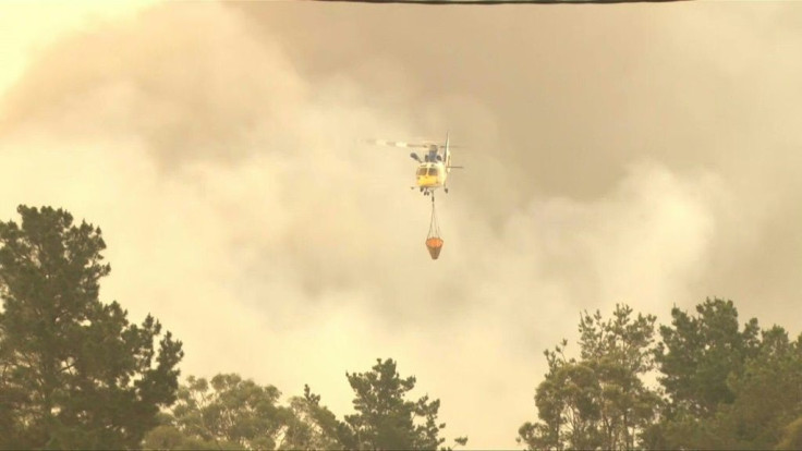 Helicopters battle raging bushfires in Australia