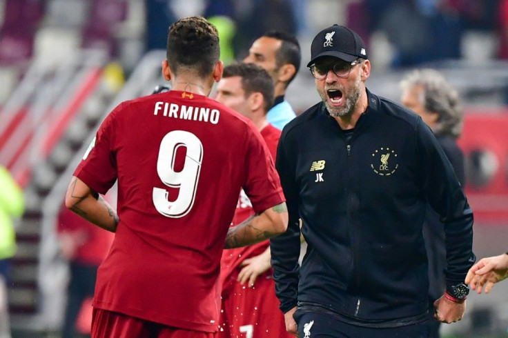 Roberto Firmino celebrates his goal with Jurgen Klopp