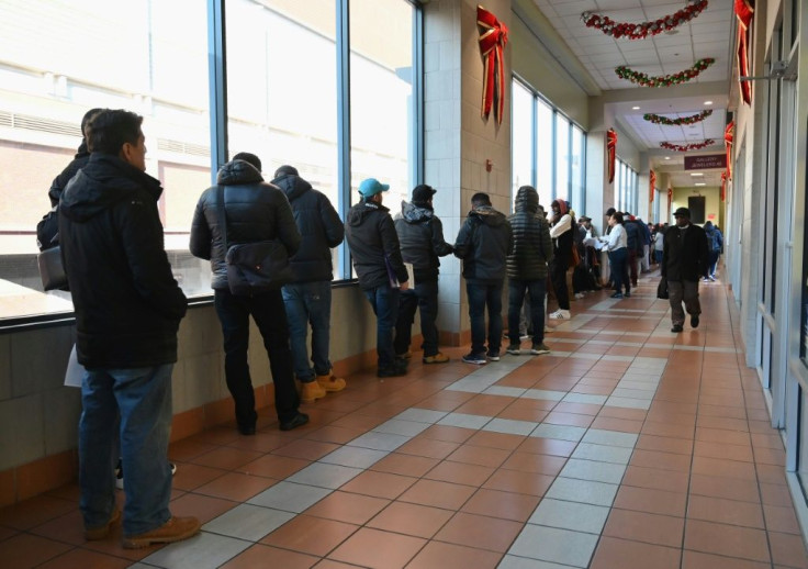 Undocumented immigrants line up to get a driver's license at the Brooklyn Department of Vehicles, New York