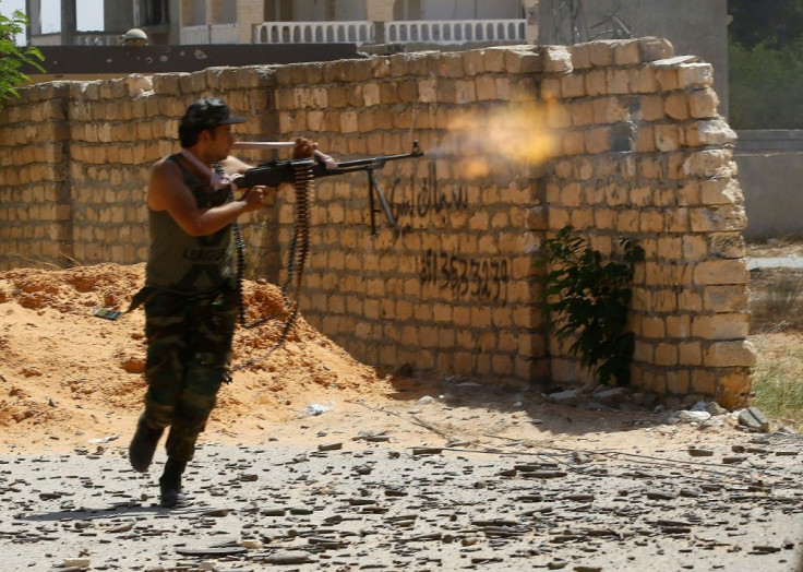 A Libyan fighter loyal to the Government of National Accord  fires towards forces loyal to strongman Khalifa Haftar in the outskirts of Tripoli, on September 7, 2019