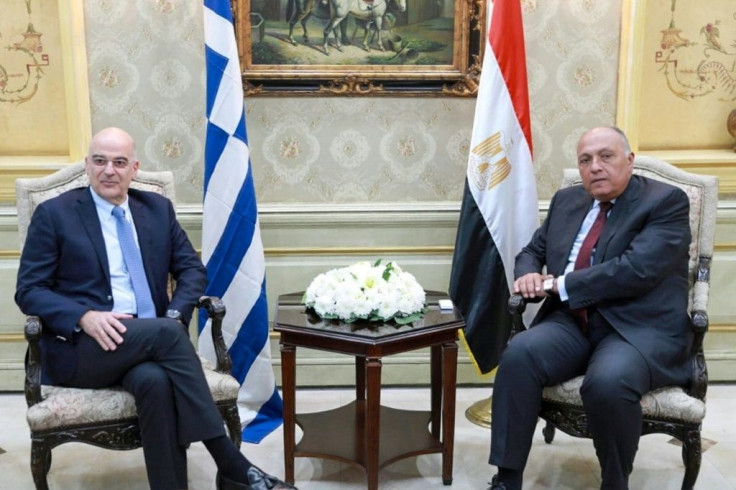 Greek Foreign Minister Nikos Dendias (L) met with his Egyptian counterpart Sameh Shoukry in Cairo on Sunday