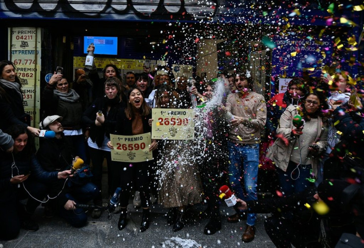 Winners of the lottery traditionally return to the bureaux where they bought their ticket to celebrate
