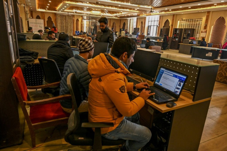 Students use the internet at a tourist reception centre. The Indian government cut Kashmir's access to the internet when it scrapped the region's autonomy in August