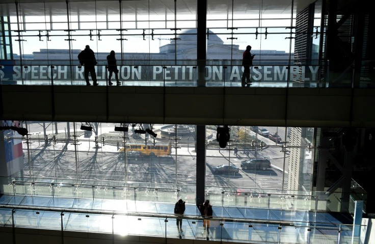 Visitors tour the Newseum on Pennsylvania Avenue, which will be closing December 31 after 12 years in Washington