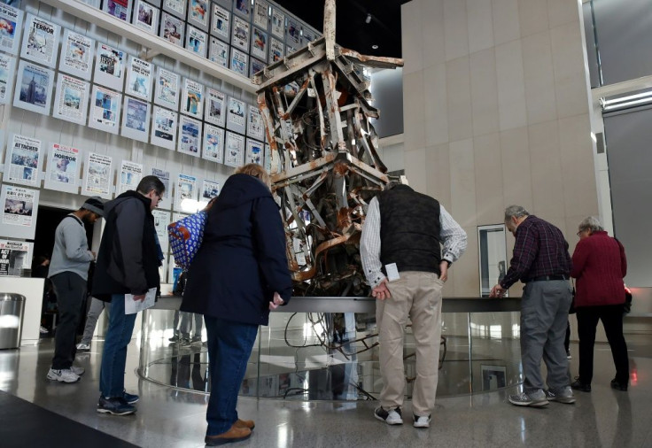 Visitors to the Newseum view a section of the television antenna that once sat atop the World Trade Center's north tower, part of the exhibit on the media and the attacks of September 11, 2001