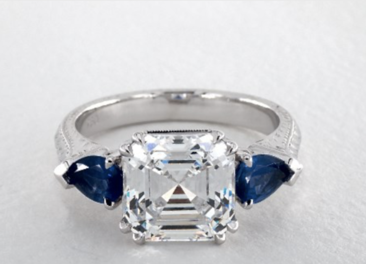 14K WHITE GOLD HAND ENGRAVED THREE-STONE ENGAGEMENT RING WITH BLUE SAPPHIRES