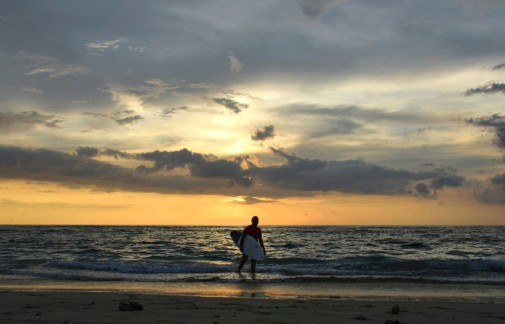 Indonesian Dery Setyawan, a survivor of the December 26, 2004 tsunami, believes surfing helps him cope with the trauma