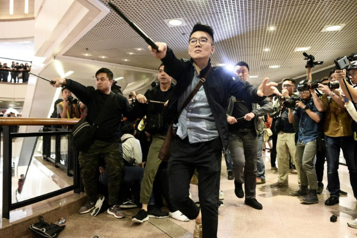 The plainclothes officers made multiple arrests as the crowds threw objects and heckled them