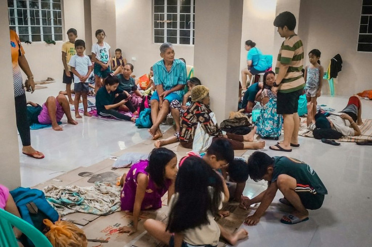 Residents rested in an evacuation centre as typhoon Phanfone made landfall in Borongan in central Philippines