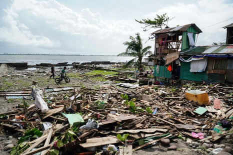Typhoon Phanfone has crumpled houses like accordions, toppled trees and blacked out cities in the Philippines' most storm-prone region