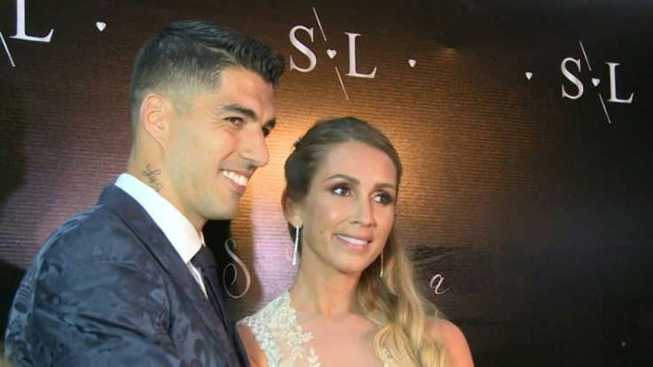 Barcelona's Uruguayan striker Luis Suarez and his wife Sofia Balbi hold a ceremony to renew their wedding vows after a decade of marriage in Uruguay, attended by his club teammates including Lionel Messi.
