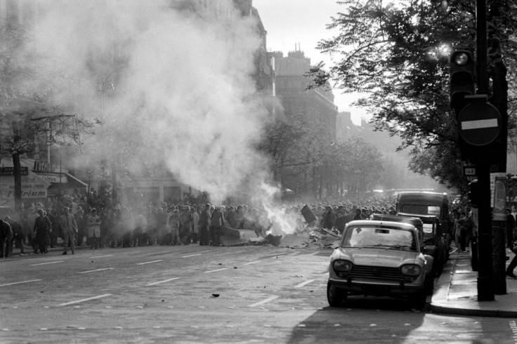 Demonstrators in Paris during protests in 1968 that paralysed France's economy