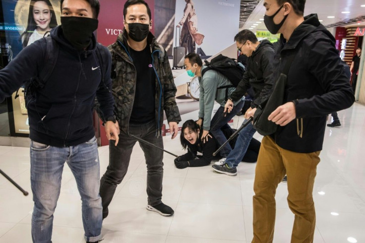 Plainclothes police detain a protester in Sheung Shui. The protests were initially sparked by an extradition bill but have since morphed into a popular revolt against Beijing's rule