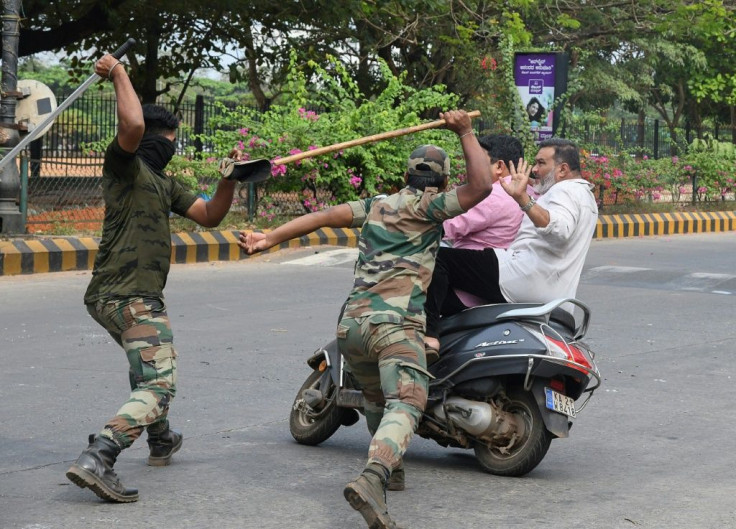 Hundreds have been injured in India during clashes between protesters and riot police wielding bamboo canes, or 'lathis'