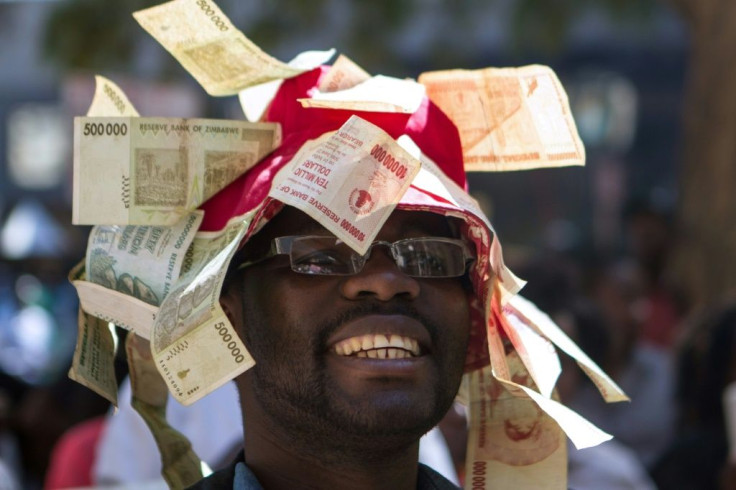 Attempts by African countries to get around fiscal constraints didn't always end well, such as this Zimbabwean man who decorated his hat with worthless currency
