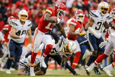 Kansas City rookie wide receiver Mecole Hardman escapes a tackle attempt by Jatavis Brown in the Chiefs' NFL victory over the Los Angeles Chargers