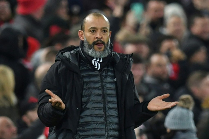 Wolves coach Nuno Espirito Santo was booked for his protests at two VAR reviews that went against his side