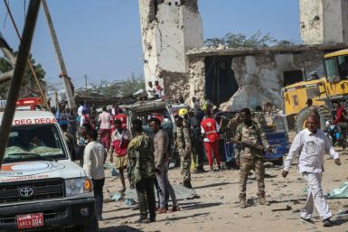 Somali soldiers secure the scene after a car bombing that killed at least 79 people in Mogadishu on December 28, 2019