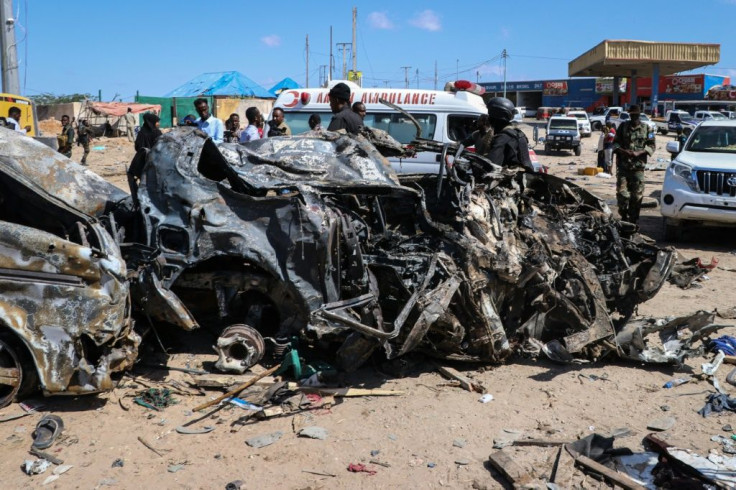 The blast left the wreckage of surrounding vehicles at the busy checkpoint and crossroads