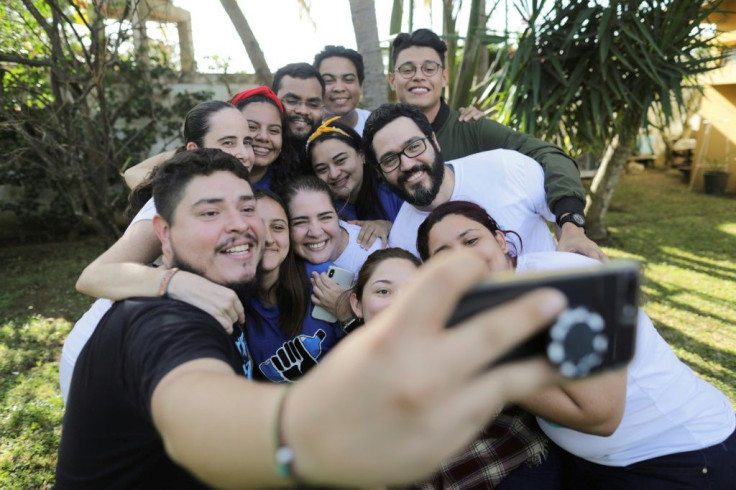 Jesus Tefel and Olama Hurtado take a selfie with members of the Nicaraguan Civic Alliance after their release from "El Chipote" prison, where they were held for delivering water to hunger-striking mothers of political prisoners