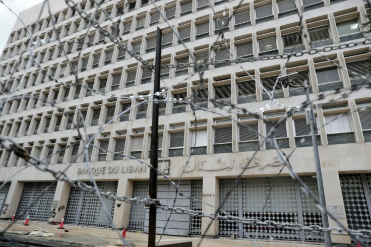Barbed wire is placed in front of the central bank headquarters in Beirut to keep protesters away