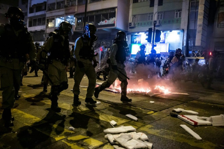 Peaceful protests on New Year's Eve morphed into tear gas-choked clashes between the police and hardcore demonstrators