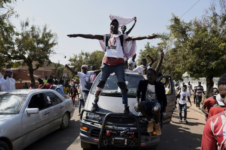 Joy: Supporters of newly-elected President Umaro Sissoco Embalo take to the streets