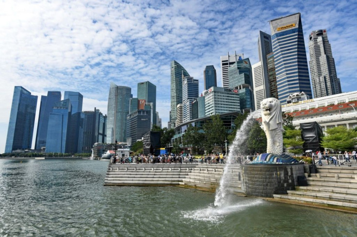 Singapore's economy grew by less than one percent in 2019, with exports hammered by the bruising US-China trade war