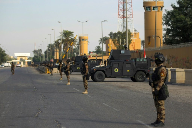 Iraqi counter-terrorism forces stand guard in front of the US embassy in the capital Baghdad