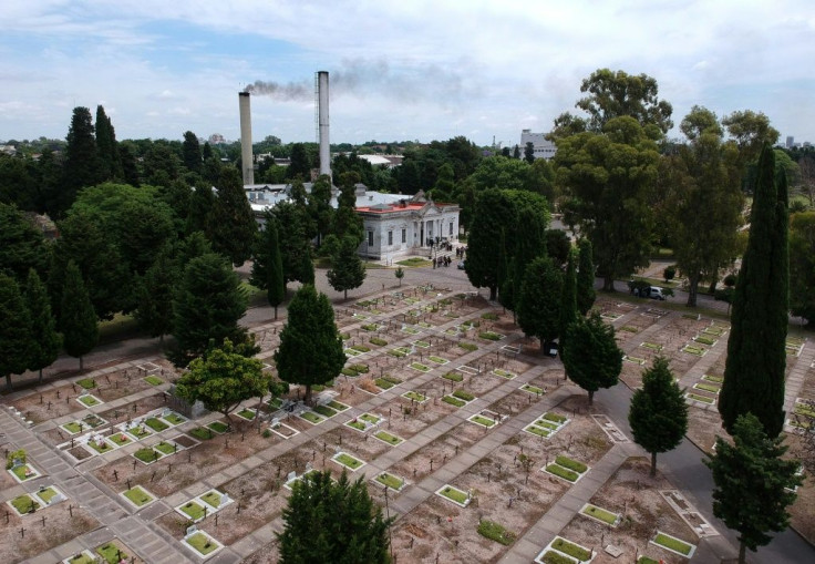 Smoke rises from a crematorium chimney at Chacarita Cemetery in Buenos Aires, Argentina, where cremation grows increasingly popular due to the high costs of traditional funerals