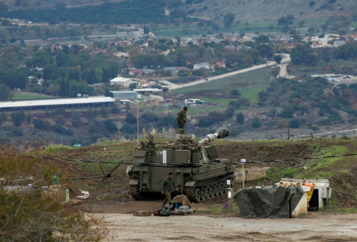 Israeli troops deployed on the annexed Golan Heights on the border with Syria