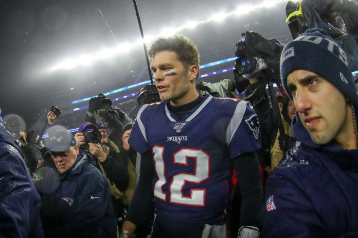 Six-time Super Bowl winner Tom Brady walks off the field after New England's 20-13 NFL playoff loss to Tennessee, what could be the final game of the 42-year-old quarterback's career