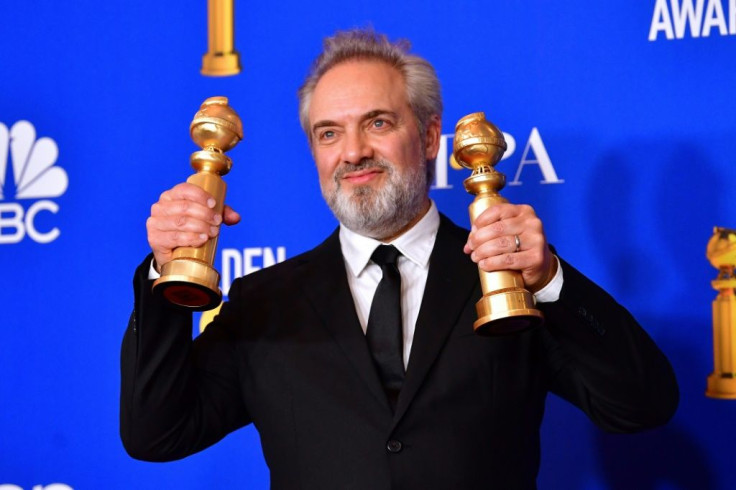 British film director Sam Mendes poses in the press room with his two Golden Globes for war epic "1917"