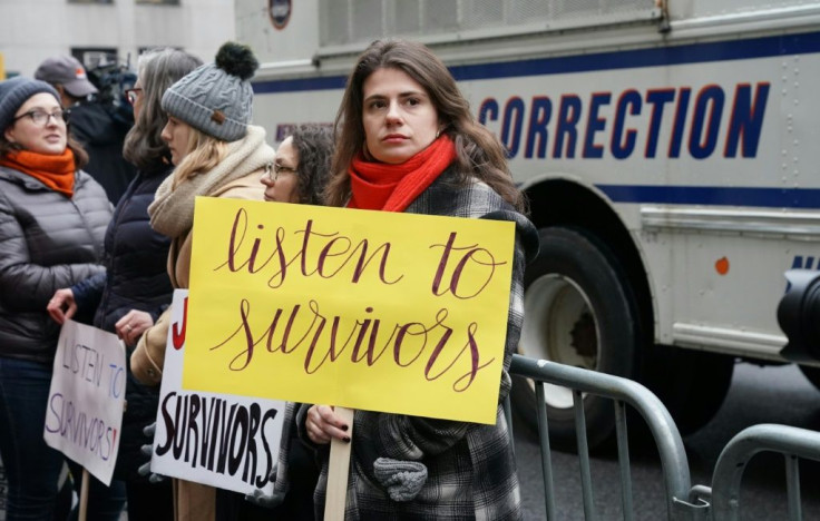 Survivors of sexual abuse gather outside the courthouse before the arrival of Harvey Weinstein at the State Supreme Court in Manhattan on the first day of his criminal trial on charges of rape and sexual assault