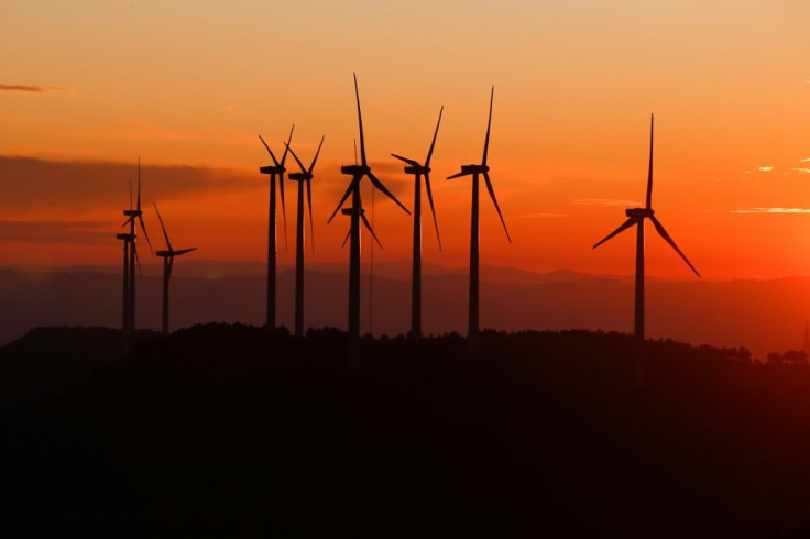 JetBlue said it will invest in solar and wind farms and other types of carbon offsets to reduce its emissions footprint