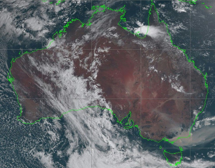 A satellite image on January 3, 2020 shows bushfire smoke (bottom right) drifting off the coast of southeast New South Wales, Australia --  a cloud of smoke from the blazes has been spotted on the other side of the Pacific Ocean