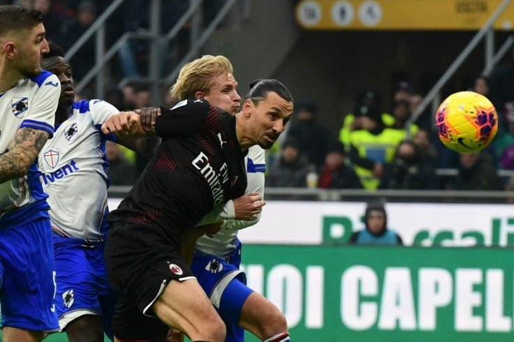 Zlatan Ibrahimovic goes for a header in his first match back for AC Milan against Sampdoria
