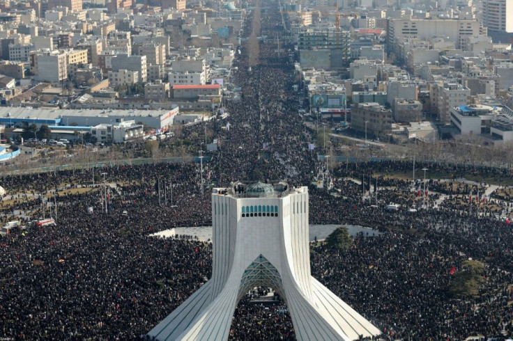 Mourners crowded the streets of Tehran on Monday to pay homage to Qasem Soleimani, whose assassination has sparked fears of a US-Iran conflict