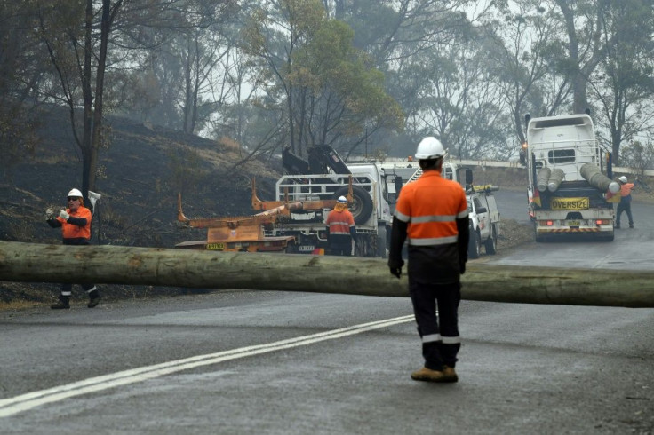 Electricity firms have started reconnecting power after bushfires destroyed utility pools