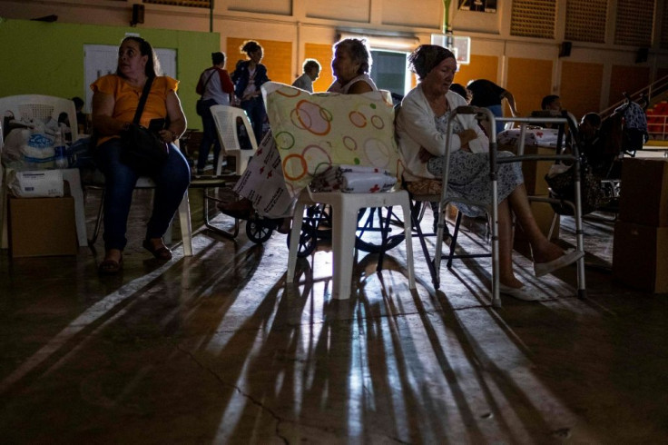 People are seen at a shelter set up after an earthquake damaged several houses in Guanica, Puerto Rico on January 6