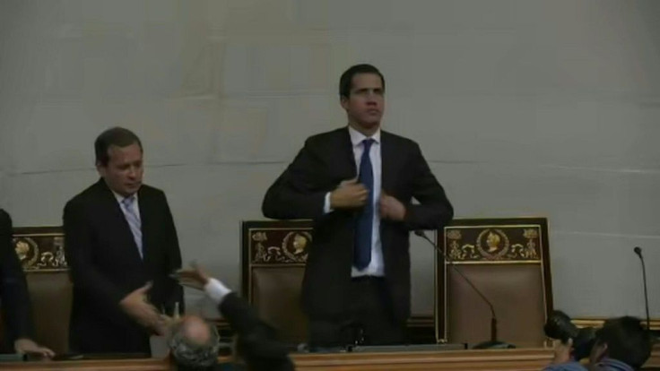 IMAGESVenezuela's opposition leader Juan Guaido takes his place in the parliament speaker's seat on Tuesday after a stand-off with the armed forces who initially prevented him from entering Congress.