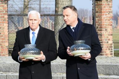 Poland's President Andrzej Duda (R, pictured February 2019 at Auschwitz) said he will not participate in the event marking the liberation of the Nazi death camp