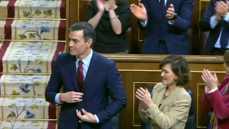IMAGES of the PM's The President of the Spanish Congress of Deputies, Meritxell Batet, announces the confirmation of Pedro Sanchez as Prime Minister after a vote.