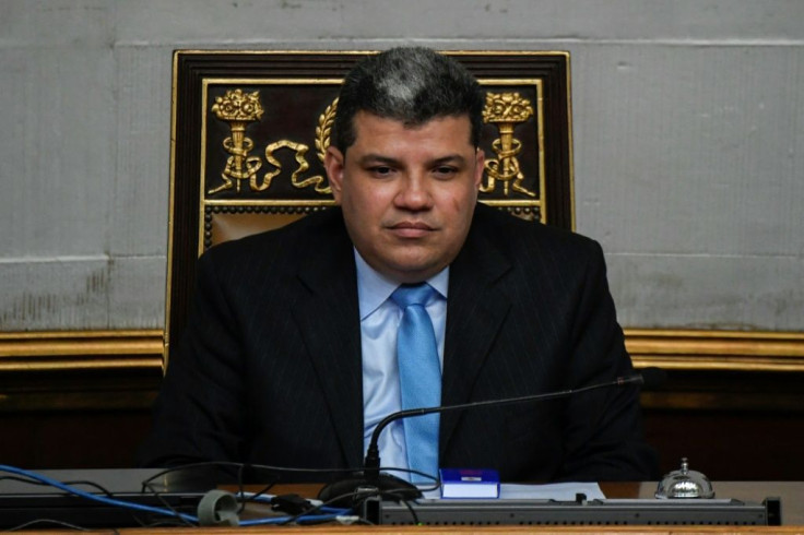 Venezuela's opposition lawmaker and self-proclamied parliament speaker Luis Parra attends a session at the National Assembly, in Caracas, on January 7, 2020 before the arrival of opposition leader Juan Guaido