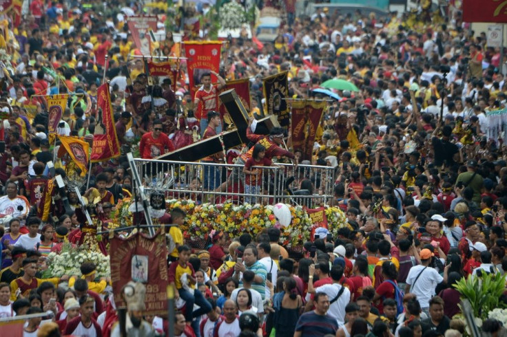 Hundreds of thousands of faithful were packed along the route for the procession of the so-called Black Nazarene, which they believe grants miracles