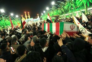Thousands of Iraqis chanted "Death to America" as they mourned an Iranian commander and others killed in a US drone attack that sparked fears of a regional proxy war between Washington and Tehran