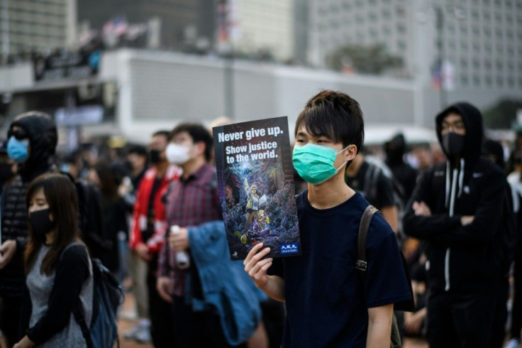 A protester holds a poster during a December 2019 rally in Hong Kong to show support for the Uighur minority in China