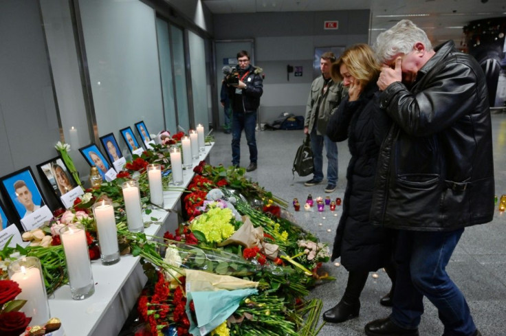 An impromptu memorial for the dead was set up at Boryspil airport outside Kiev where the Ukraine International Arlines flight had been scheduled to land on Wednesday