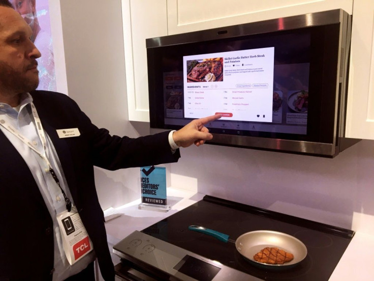 Jeremy Miller of GE Appliances shows a smart hub which uses artificial intelligence to help consumers with meal planning and preparation, at the 2020 Consumer Electronics Show in Las Vegas
